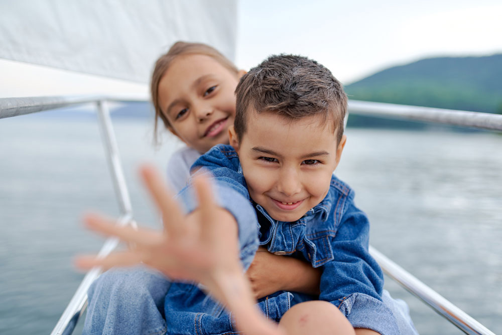 https://visitcrawford.org/wp-content/uploads/2022/06/kids-on-boat.jpg